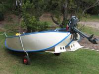 Porta Bote assembled with outboard motor and clamp on wheels in place (82 kB)