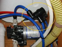 water filter 
            fitted to inlet plumbing (80 kB)